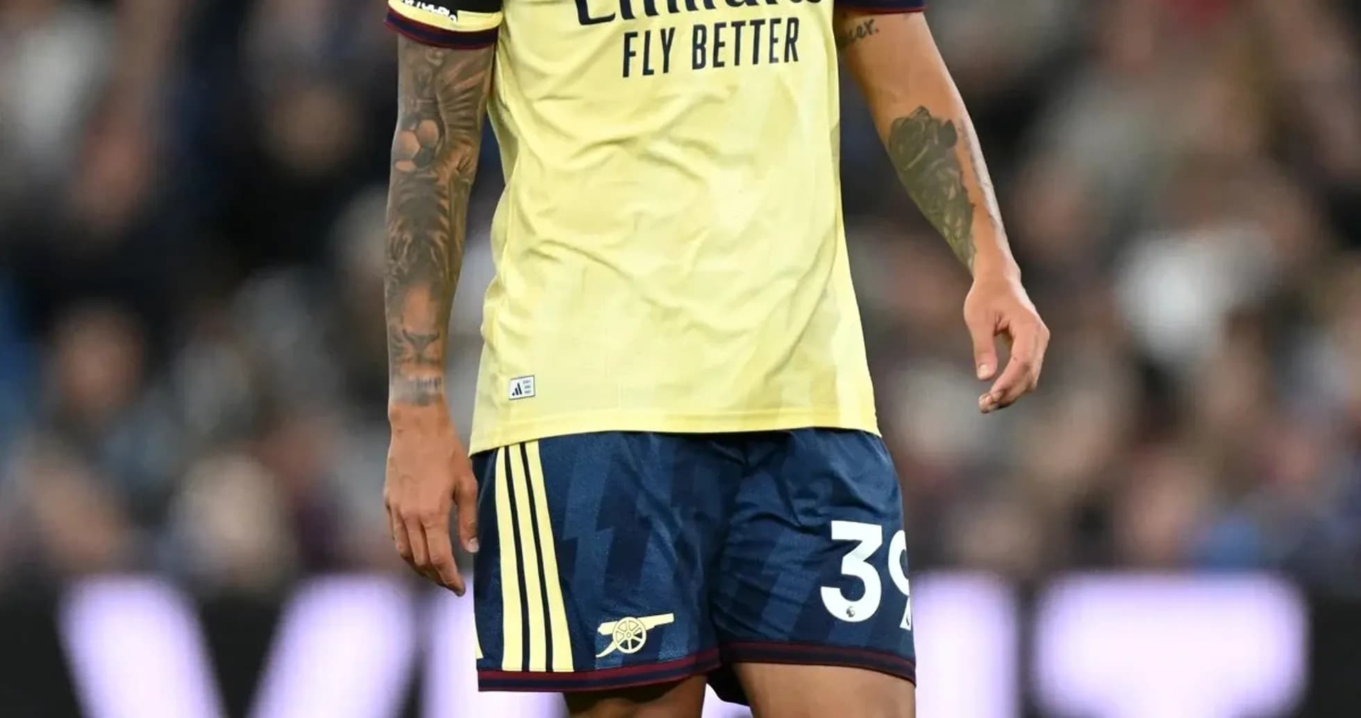 Player wearing Arsenal kit during a match