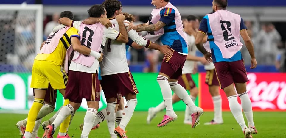 Spain players celebrating during World Cup match