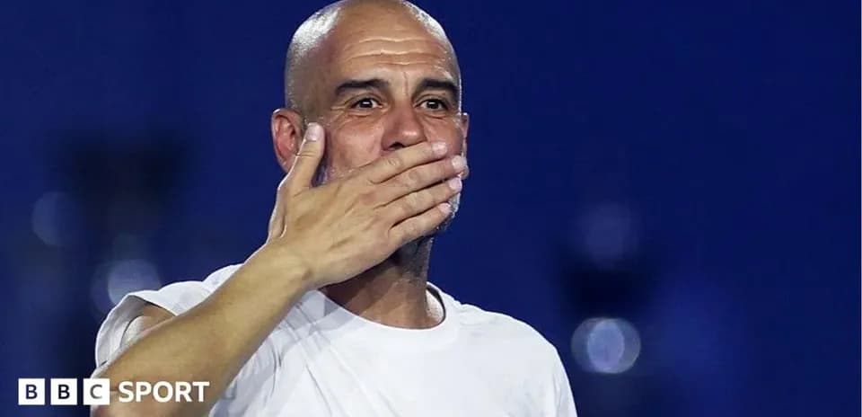 Coach gesturing to fans after match celebration