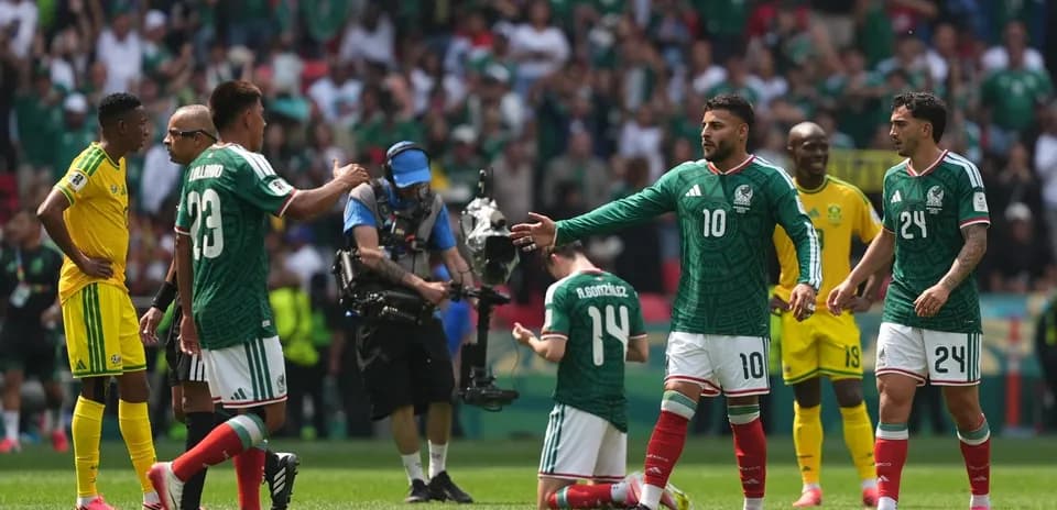 Players interacting during Mexico vs South Africa match