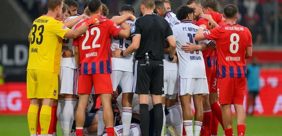 Players from both teams gathered around an official