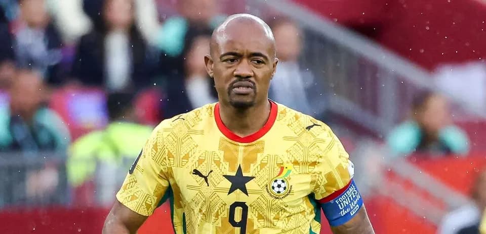 Ghana player in yellow jersey during match