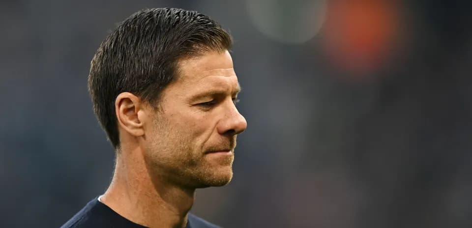 Coach looking pensive during match preparations