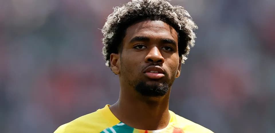 Player in colorful jersey before the match