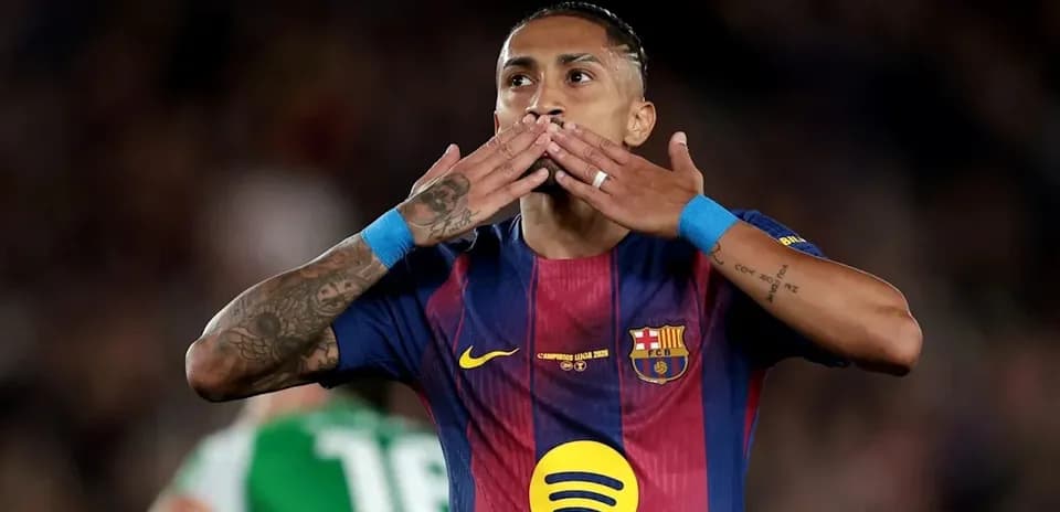 Barcelona player celebrating with kiss gesture