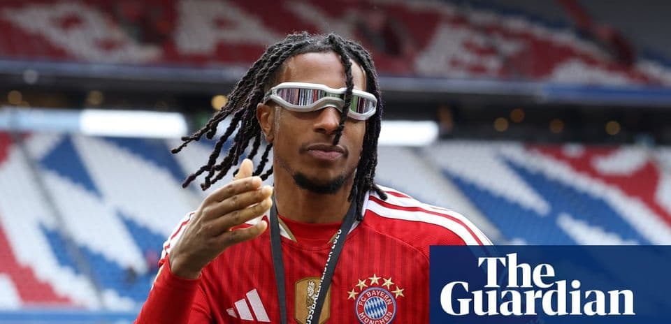 Player in Bayern Munich kit gesturing on the pitch