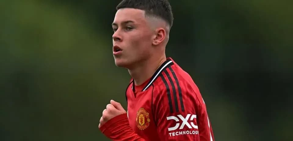 Young player in Manchester United training kit running