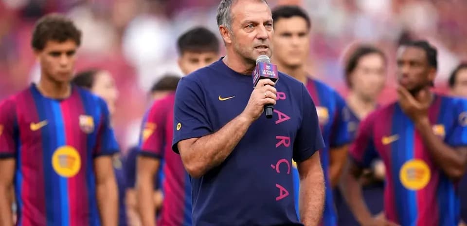 Coach speaking to players during team event