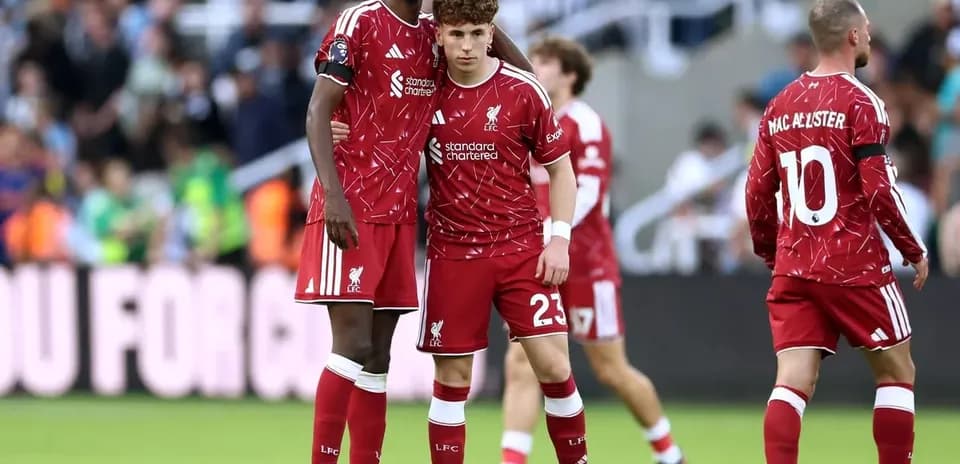 Liverpool players in red kits during match