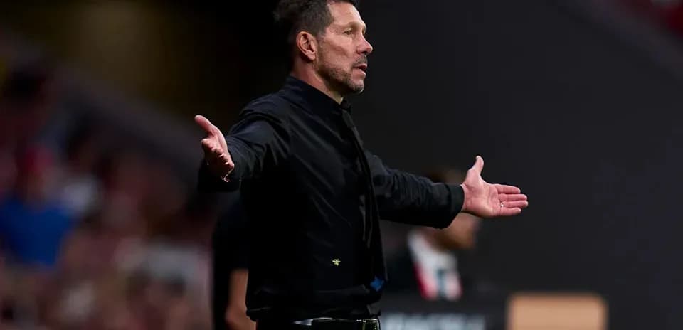 Coach gesturing during match from the sideline