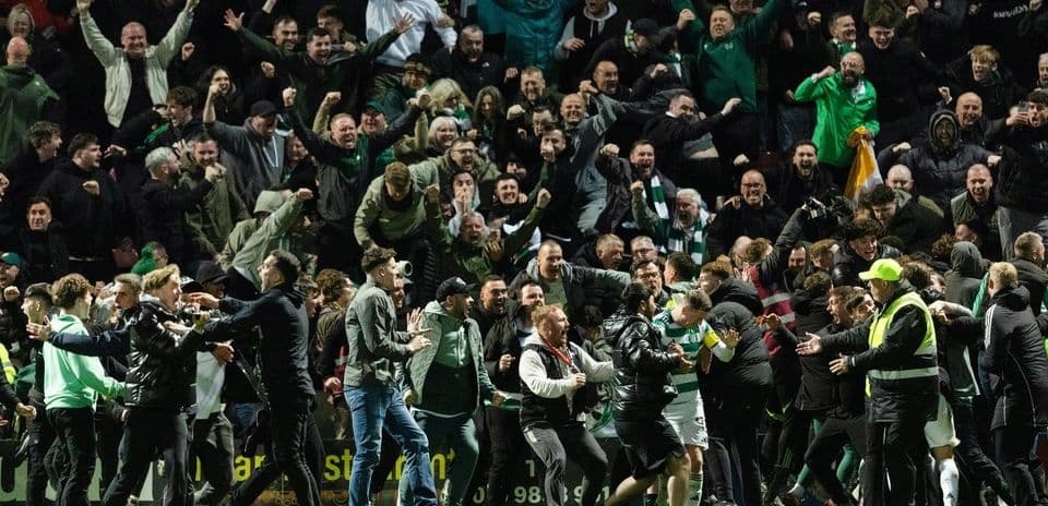 Crowd celebrating during a football match