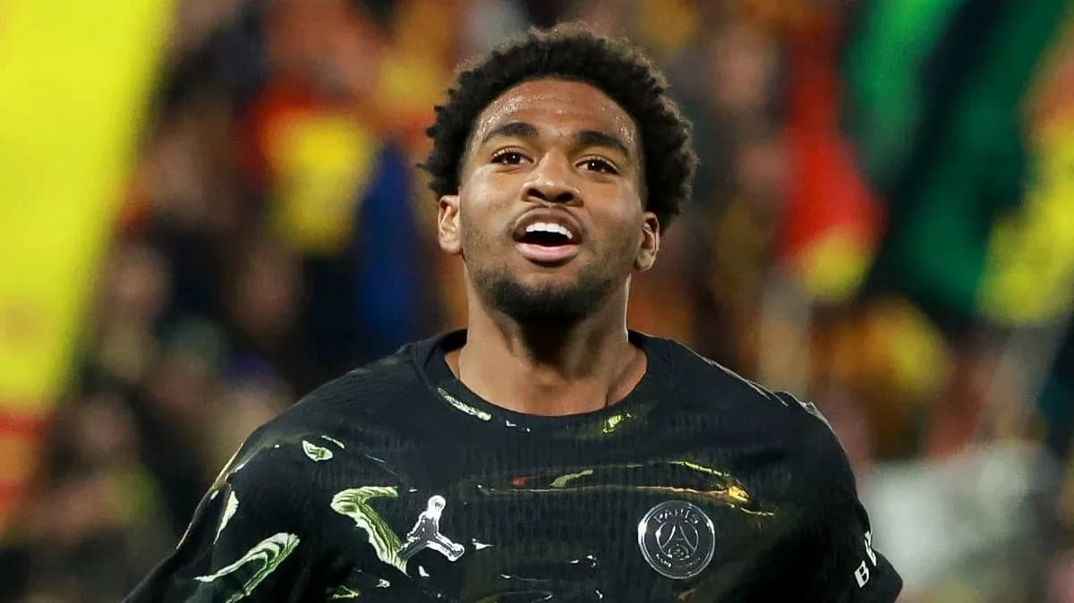 Player celebrating during match with crowd in background