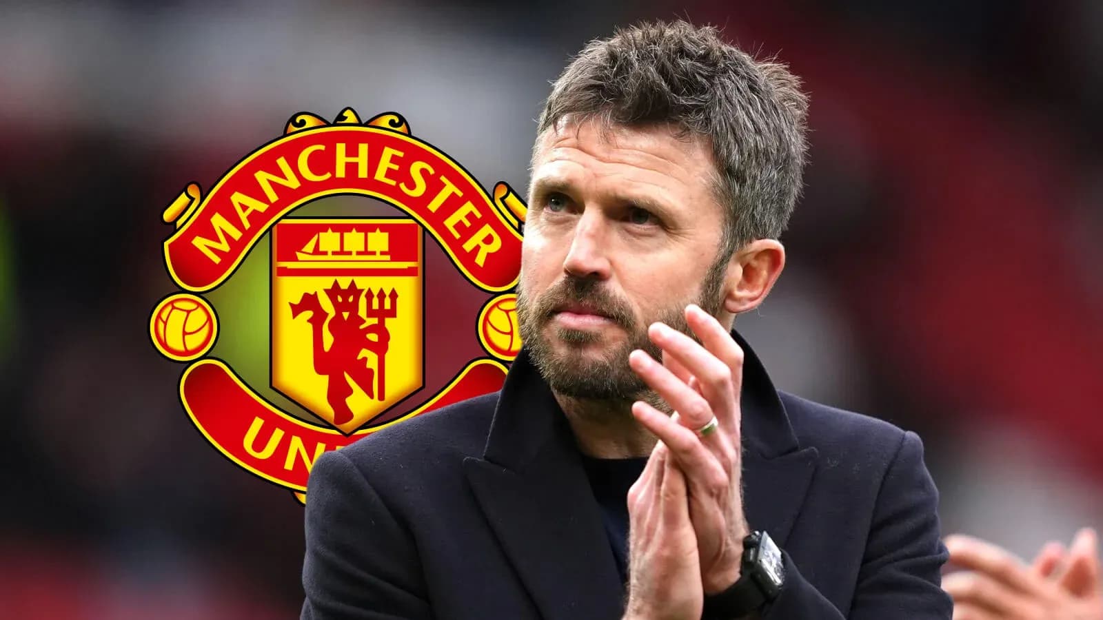 Man in suit applauding with Manchester United logo background