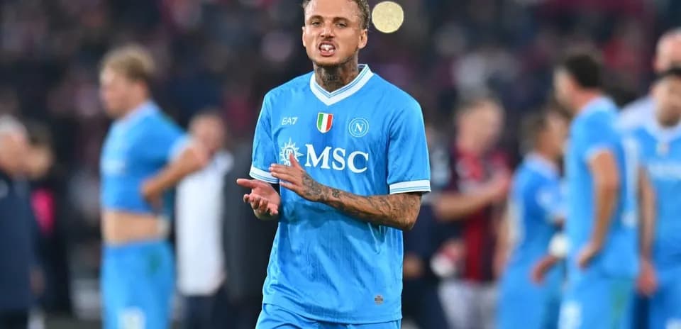 Player in blue Napoli jersey reacting on the field