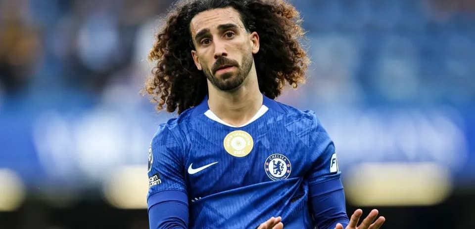 Player in Chelsea kit gesturing during match