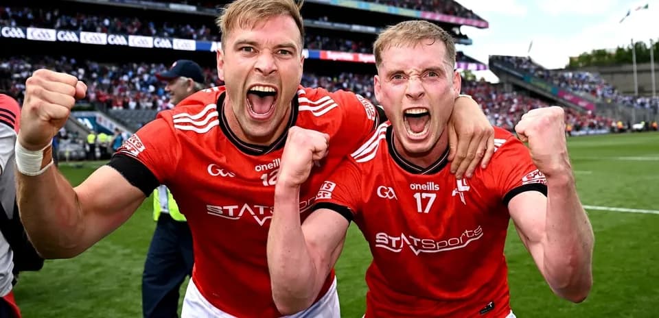 Two players celebrating victory on the field