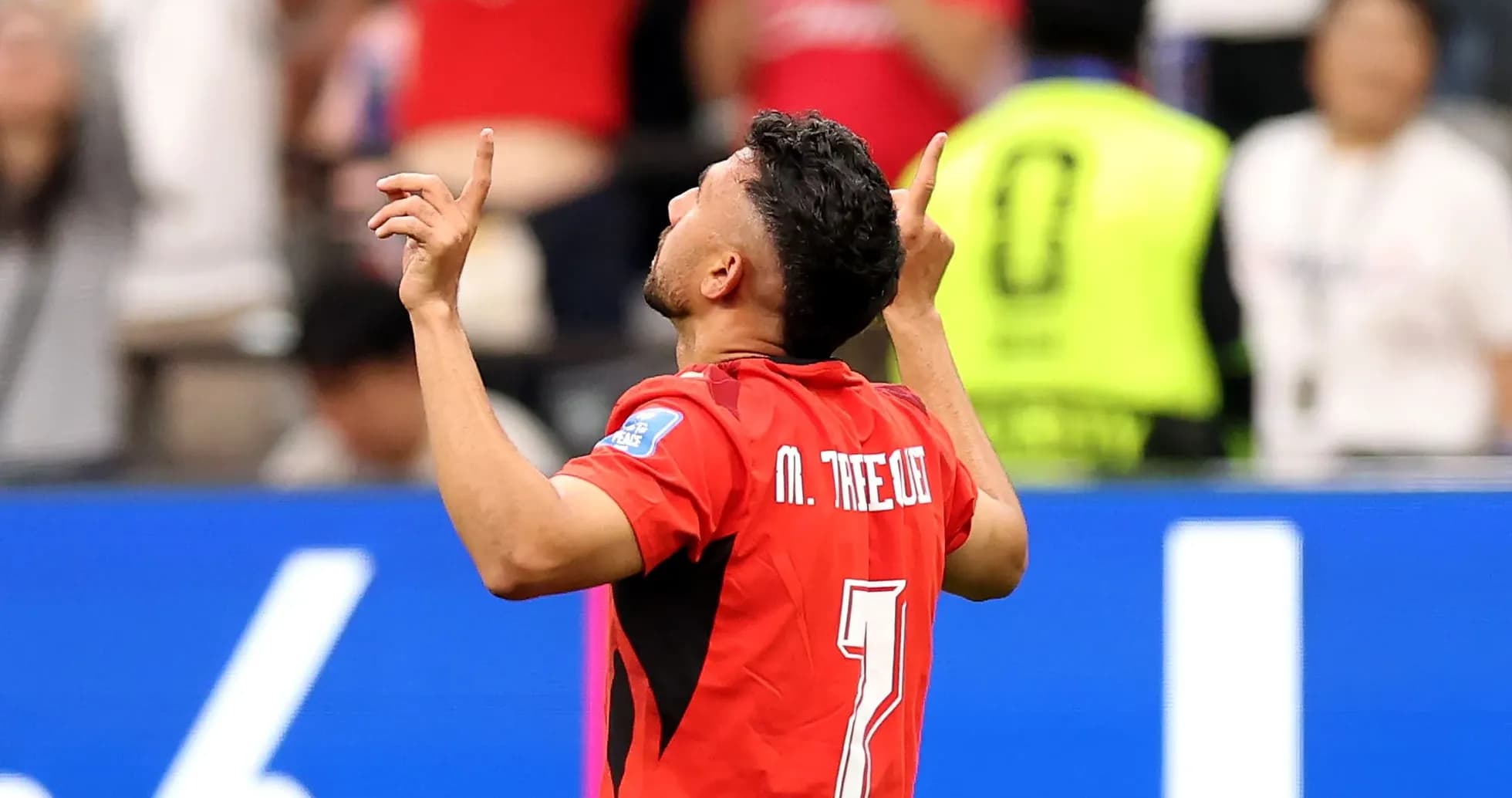 Player celebrating after scoring a goal in match