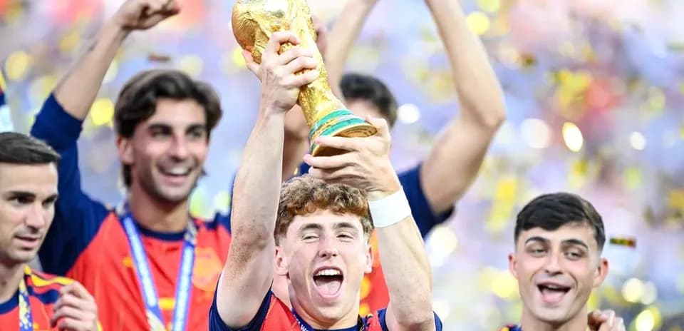 Spanish team celebrating World Cup victory with trophy