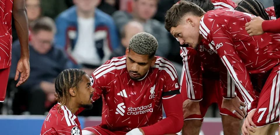 Liverpool players discussing during a match