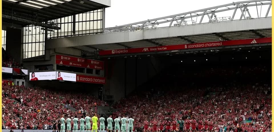 Teams lined up in tribute at Anfield stadium