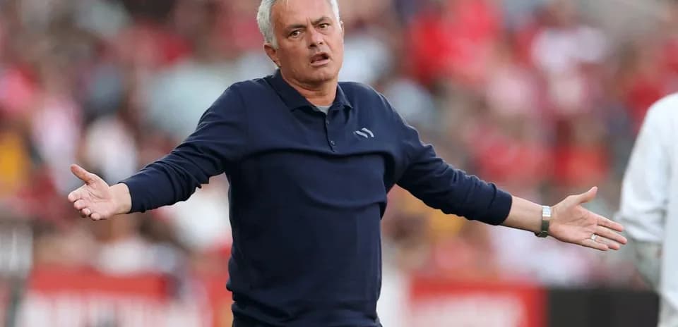 Manager gesturing during a football match
