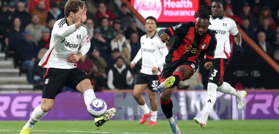Fulham player tackles Bournemouth forward