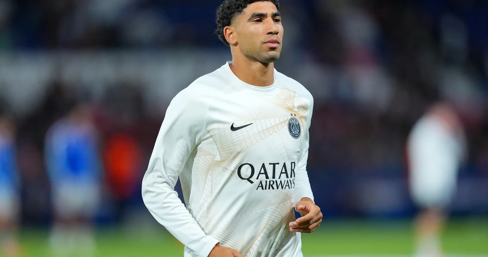 Player warming up in Paris Saint-Germain jersey