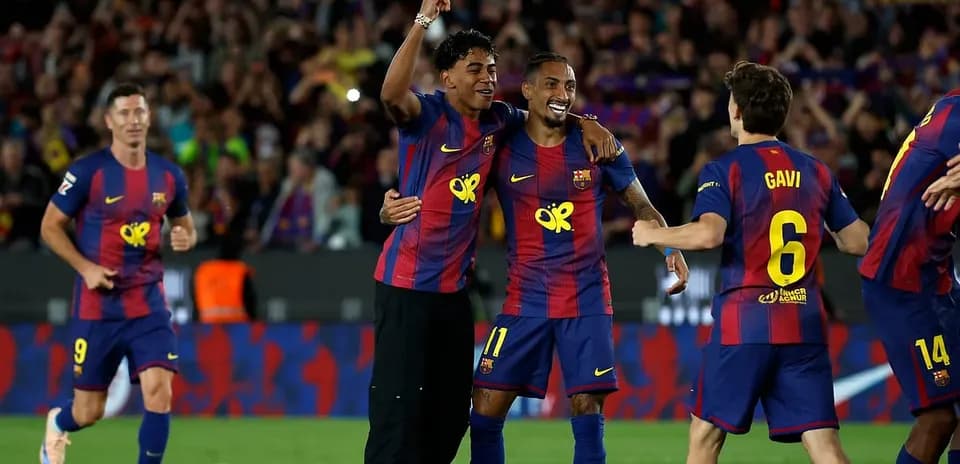 Barcelona players celebrating a goal during La Liga match