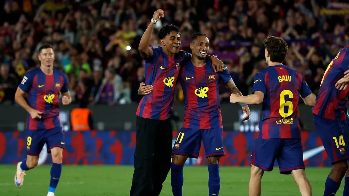Barcelona players celebrating a goal during La Liga match