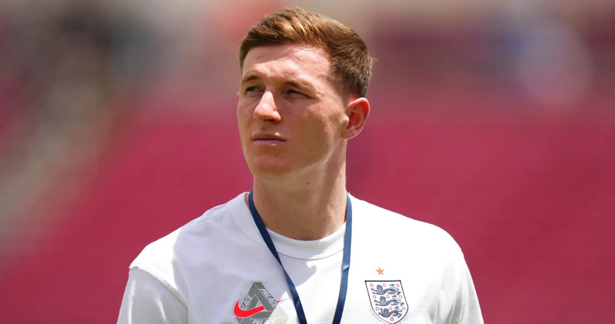 Player in England training kit at stadium