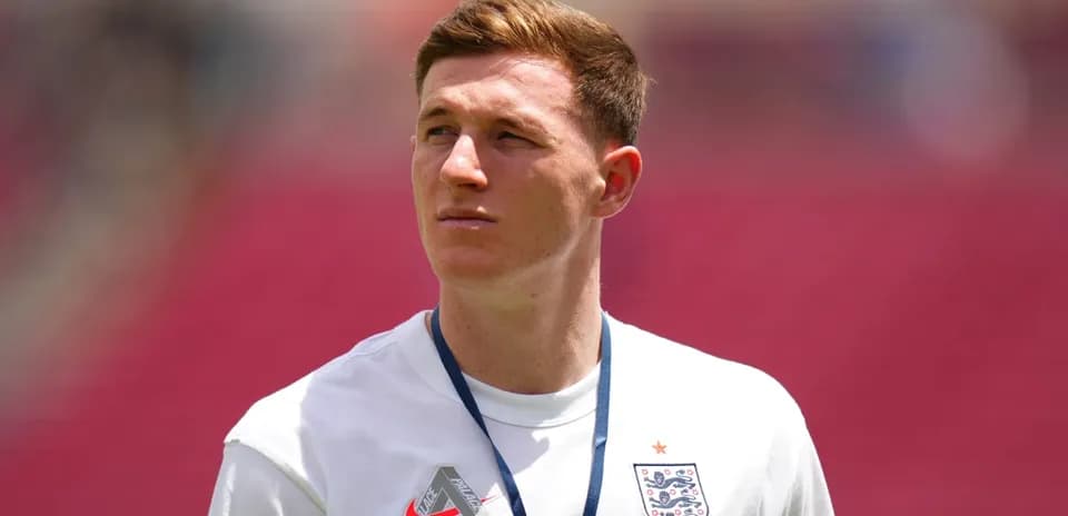 Player in England training kit at stadium