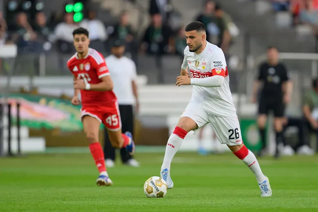 Player dribbling the ball during a football match