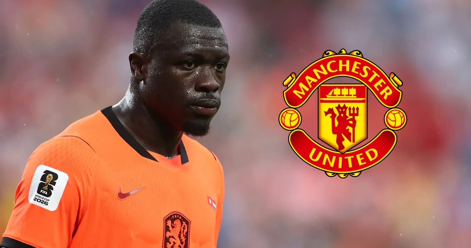 Player in orange jersey with Manchester United logo