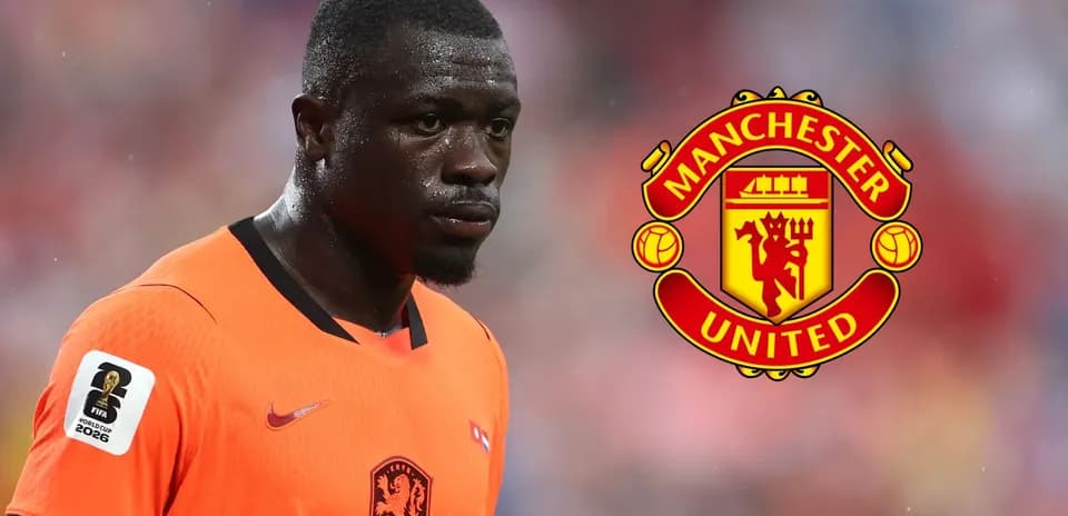 Player in orange jersey with Manchester United logo