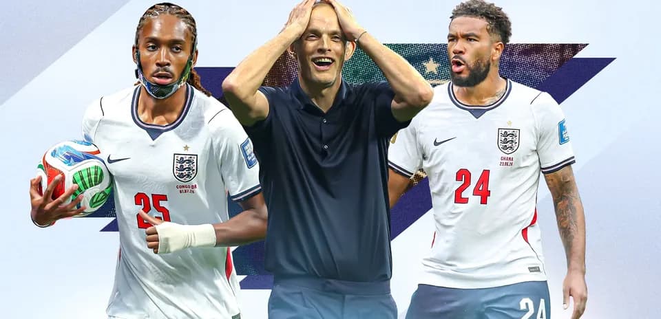 Three soccer players in England kits posing together