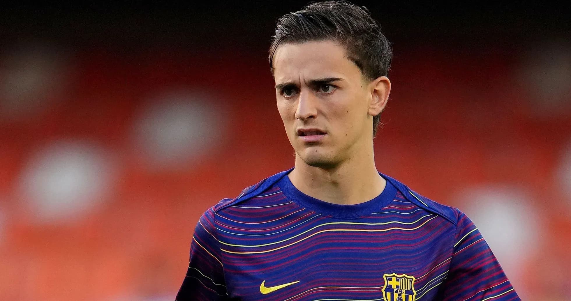 Football player wearing FC Barcelona training kit