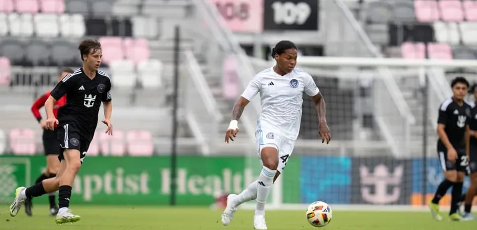 Inter Miami II player dribbling past NYCFC II opponent