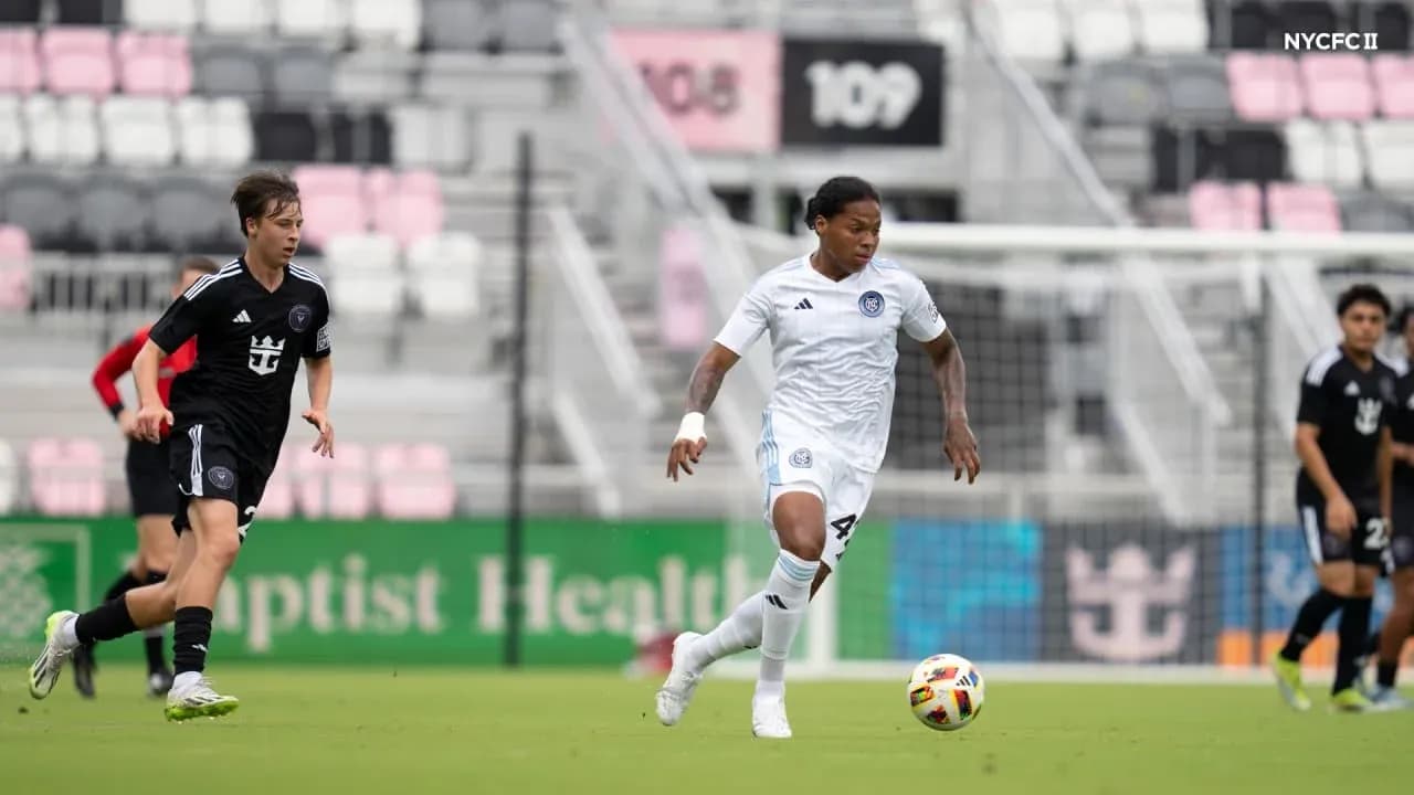 Inter Miami II player dribbling past NYCFC II opponent