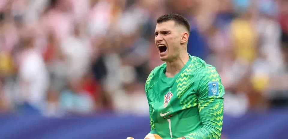 Goalkeeper celebrating during a match in Croatia kit