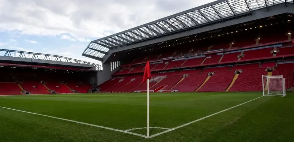 Corner flag at Anfield stadium with empty seats