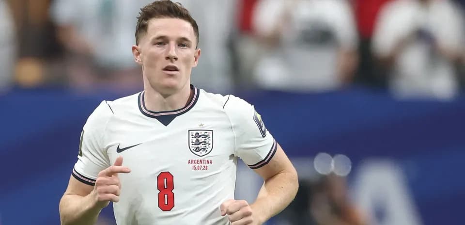 Player wearing England jersey running on field