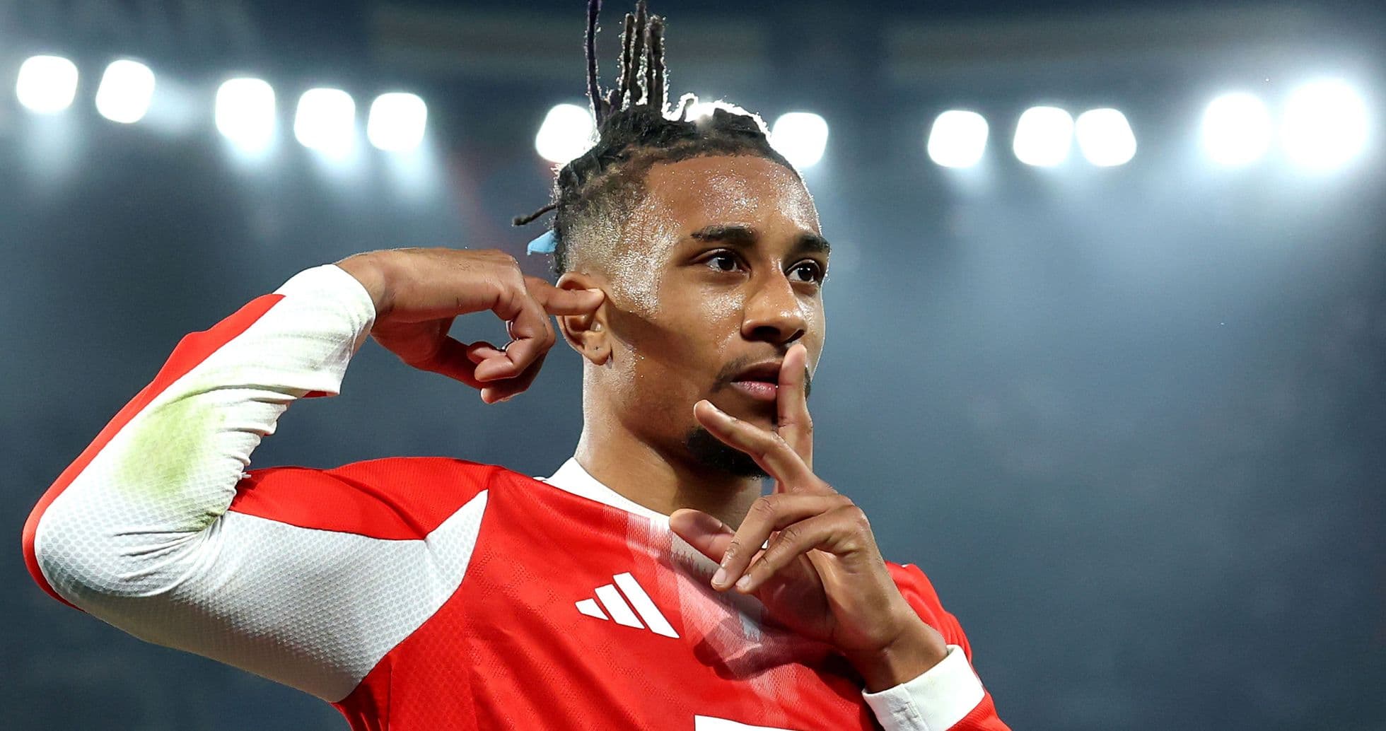 Player celebrating with finger to lips gesture