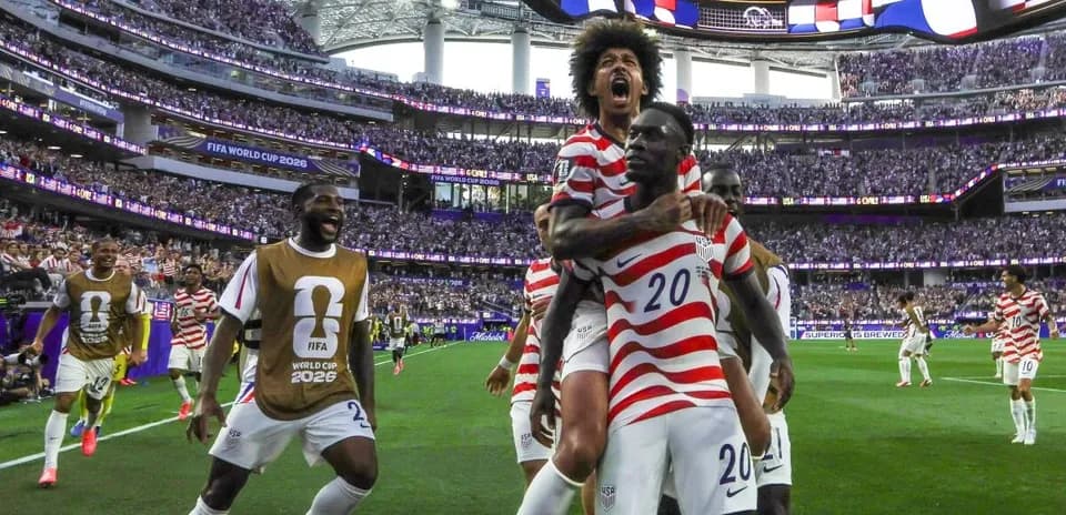 Players celebrating a goal during FIFA World Cup match