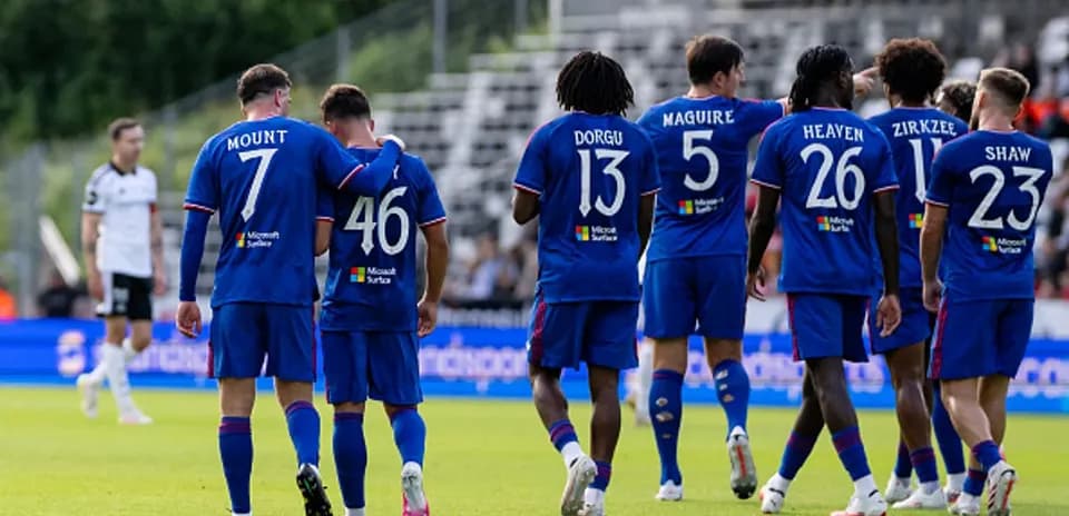 Players celebrating together during a match