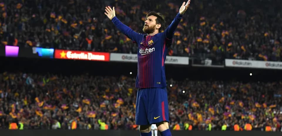 Lionel Messi celebrating in front of fans