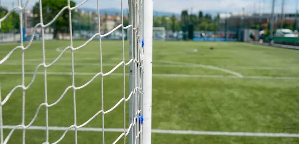Close-up of soccer goal on a field