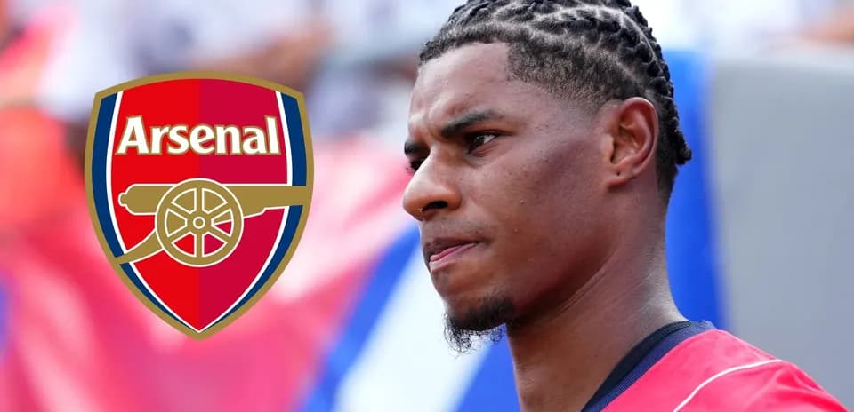 Player with braided hair near Arsenal logo