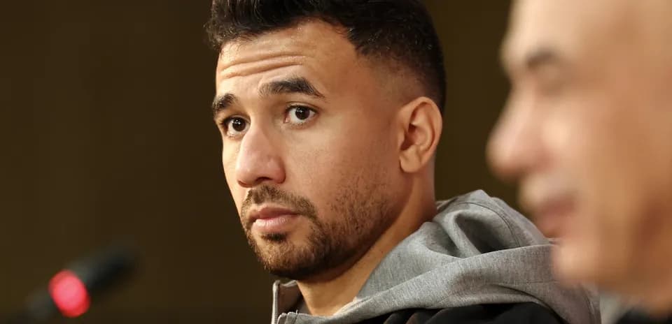 Player at press conference with microphone visible