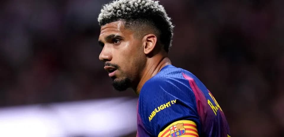 Football player wearing Barcelona jersey during match