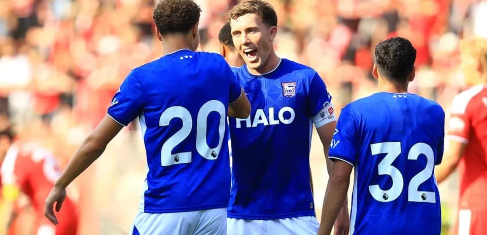 Players celebrating during a football match